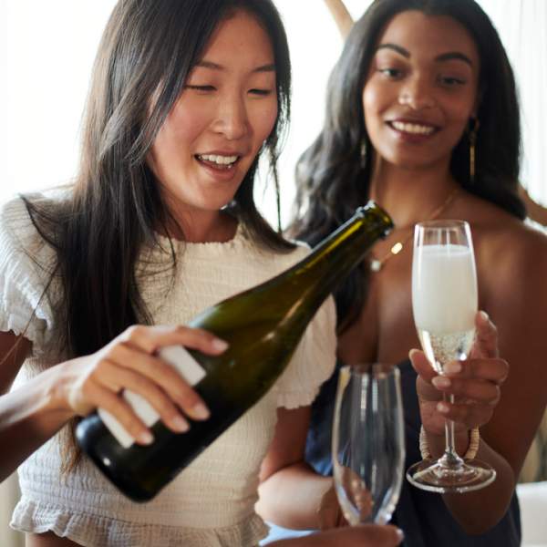 Women pouring champagne 