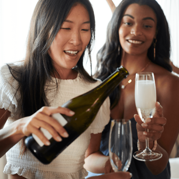 Women pouring champagne 