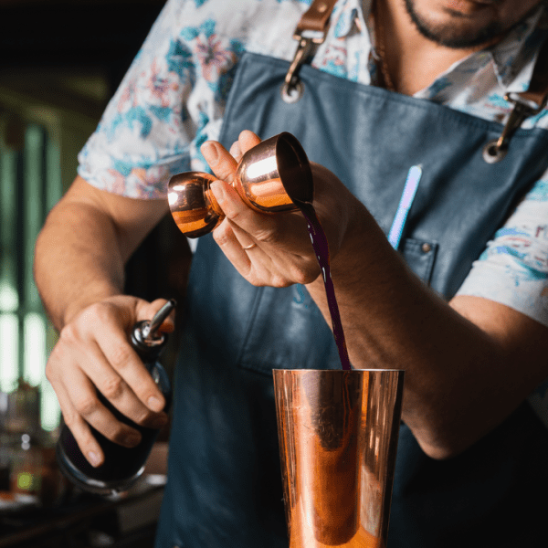 Steven Minor making a cocktail