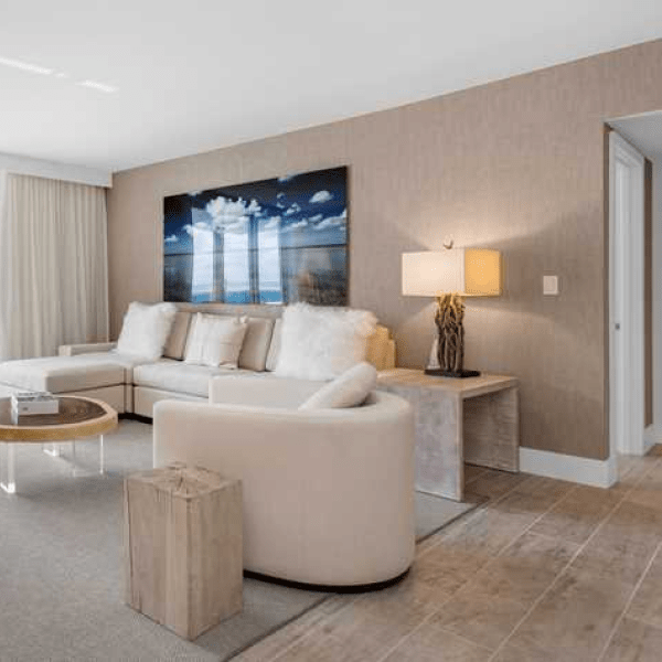 Living room area with sectional couch and a chaise lounge