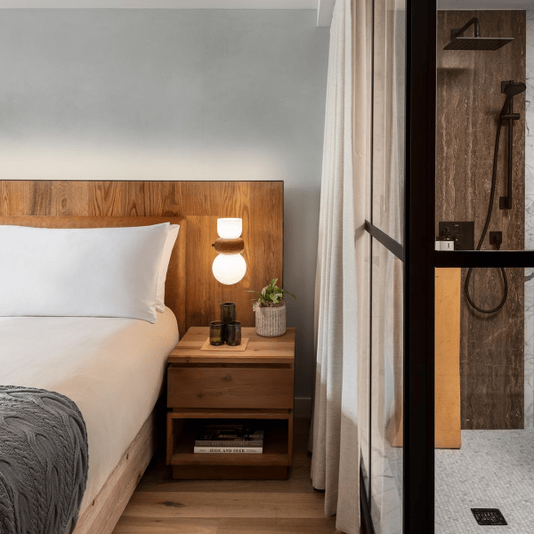 Bed next to a shower