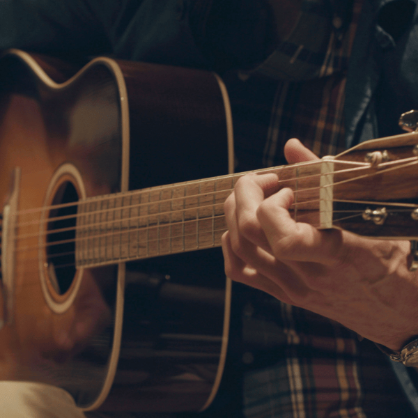 Person playing guitar 