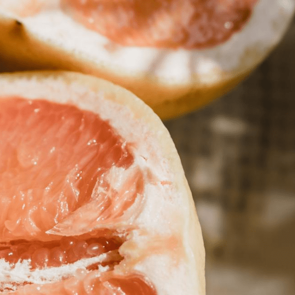 An up close shot of an orange that has been cut in half