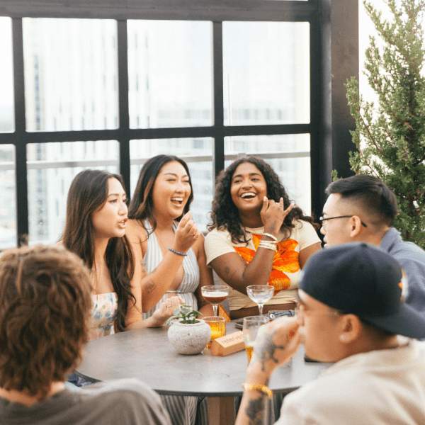 friends hanging out on an outdoor rooftop