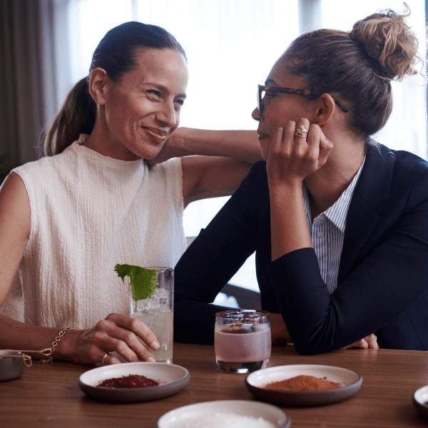 Two people having a cocktail 