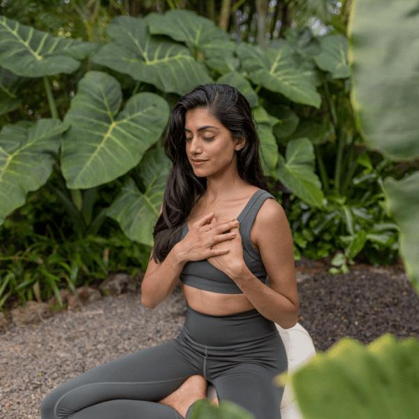 Women meditating outside