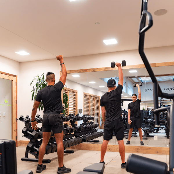 two people working out in a gym
