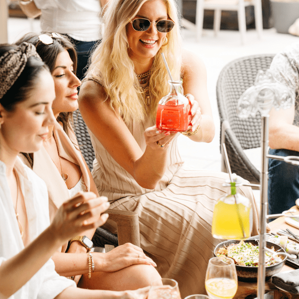 girls at brunch on a rooftop