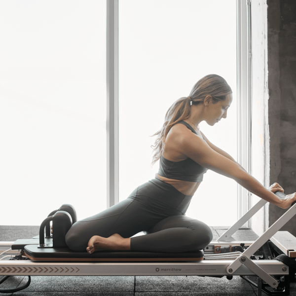 Person stretching in a gym
