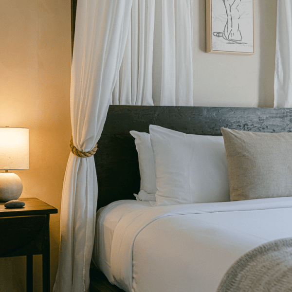 a bed and lamp