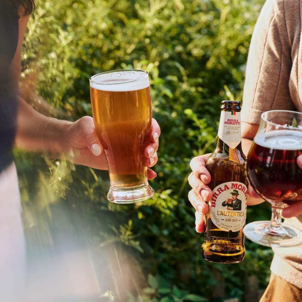 people standing outside with beer