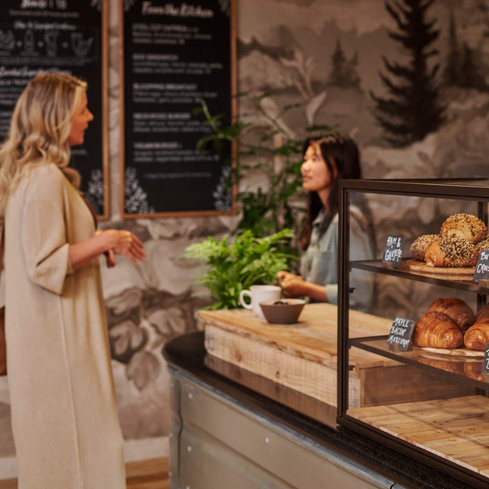 girl buying coffee at a coffee shop