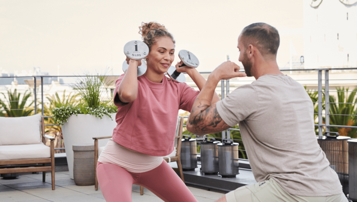 People working out at the 1 Hotel San Francisco rooftop