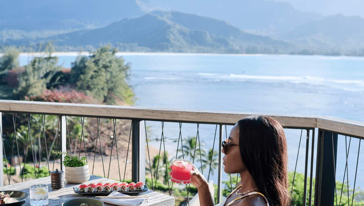 Woman on terrace at 1 Hotel Hanalei Bay