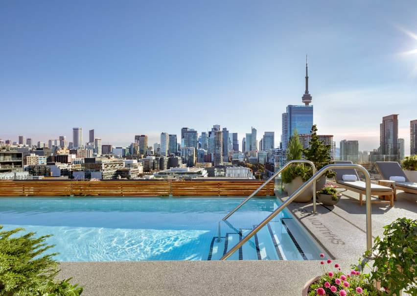 Rooftop pool with the Toronto skyline in the background 