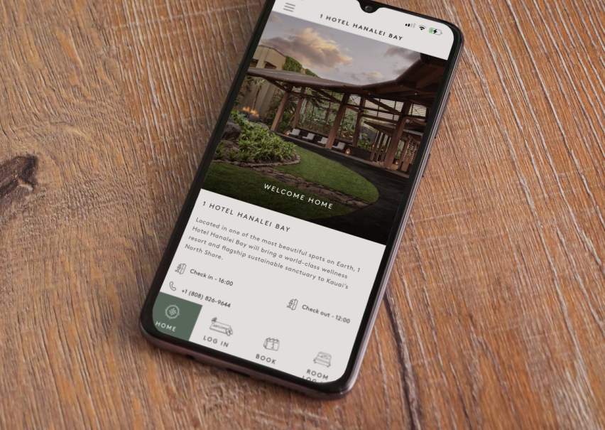 Cellphone with 1 Hotels App loaded on screen