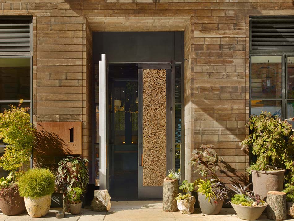 The door of 1 Hotel Central Park, made from salvaged wood