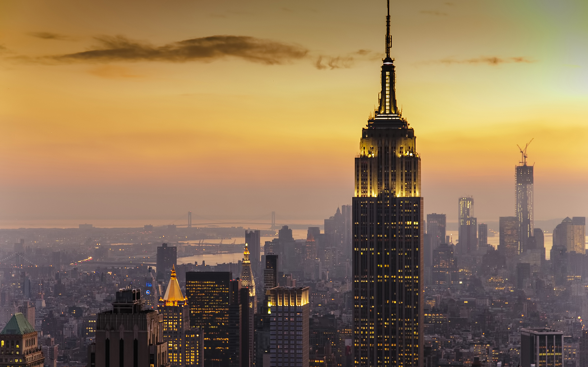 The Empire State Building and NYC skyline at sunset