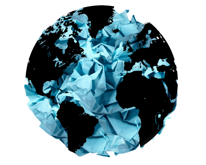 A blue and black globe made from crumpled paper