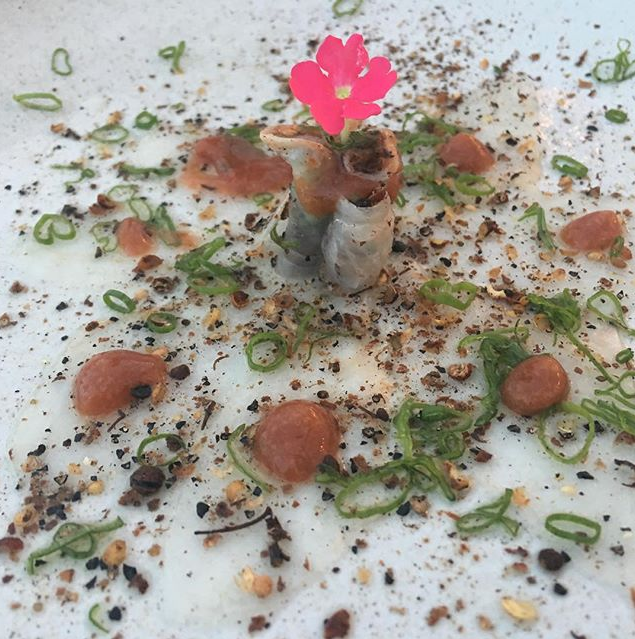 Rolled raw fish with a flower
