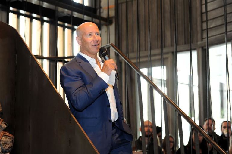 Barry Sternlicht, the founder, chairman, and CEO of Starwood Capital Group speaking to a crowd