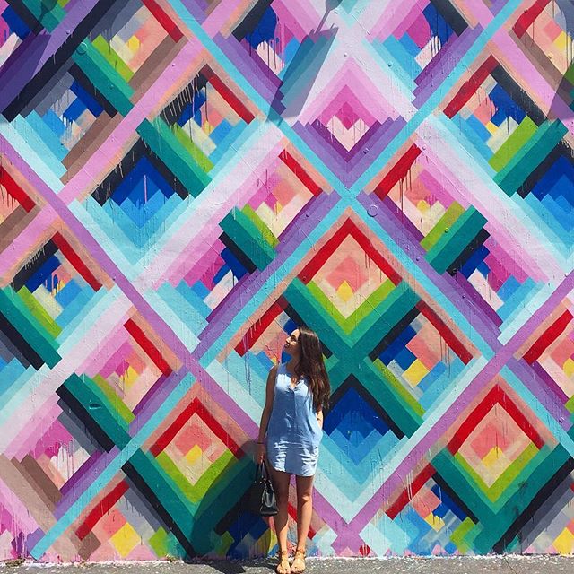 Woman in front of art wall in Wynwood