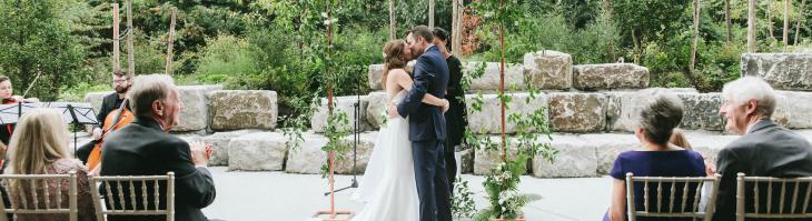 Couple kissing at the altar