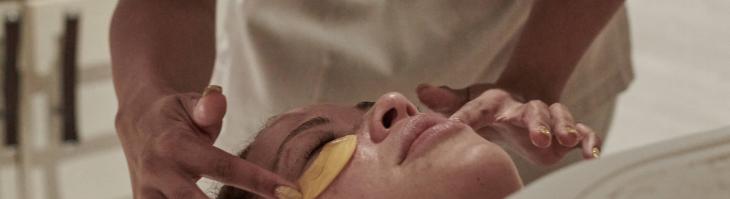 woman receiving a facial treatment