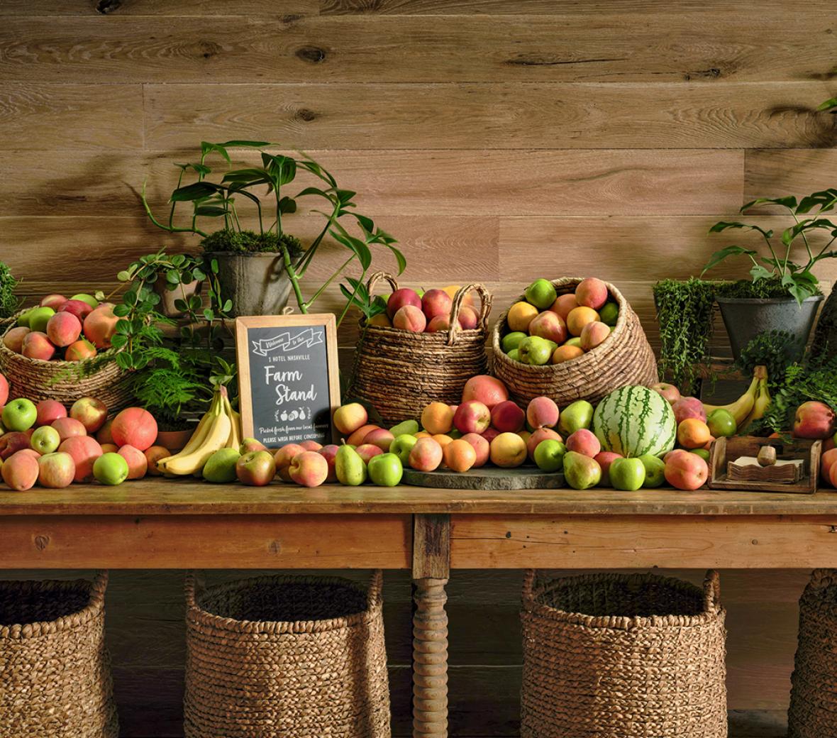 fruit on wood table with plants