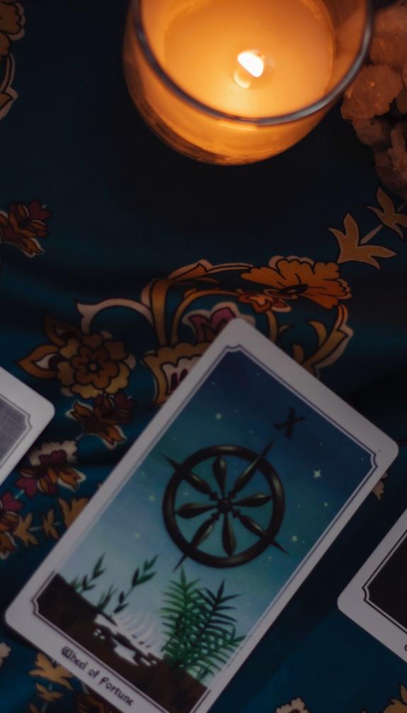 tarot cards with candle