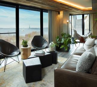 The living area of the Skyline suite at 1Hotel Brooklyn Bridge
