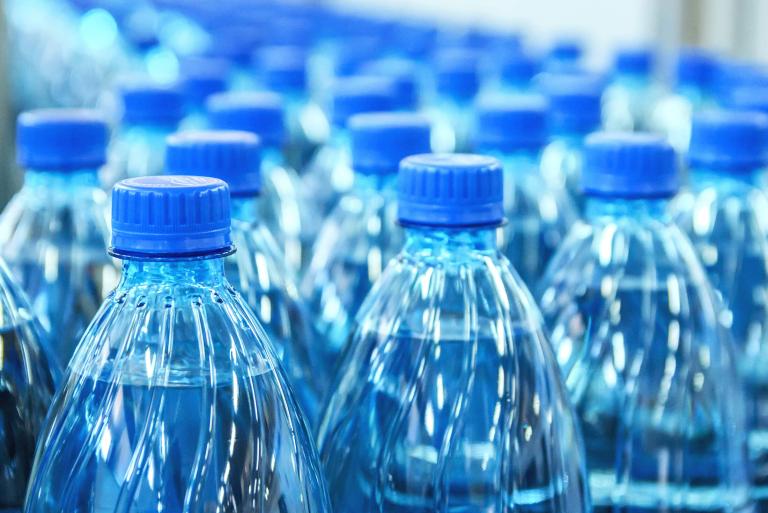 Row of plastic water bottles