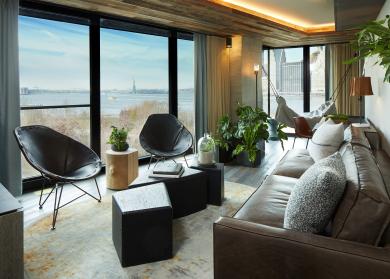 The living area of the Skyline suite at 1Hotel Brooklyn Bridge
