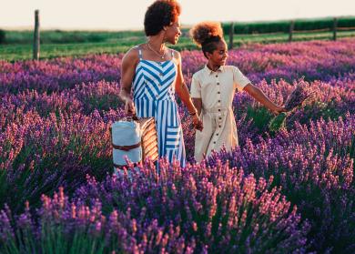 Woman and Girl in Field of Flowers